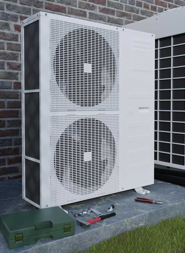 Doppelte Wärmepumpe mit Werkzeugen davor